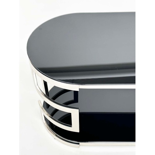 292 - LOW TABLE, oval black glass and chrome with two tiers, 117cm W x 56cm H x 56cm D.