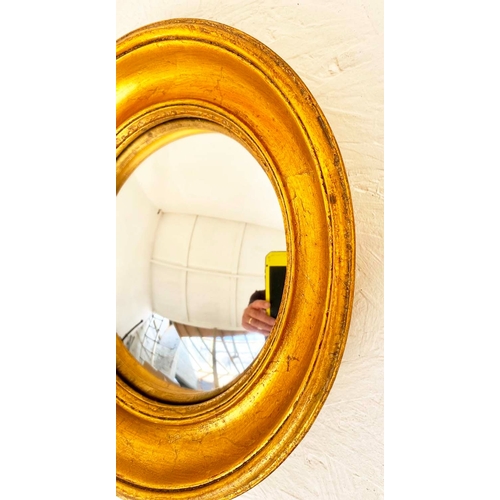 351 - CONVEX MIRRORS, a collection of twelve, Regency style gilt frames, of various sizes and designs, lar... 