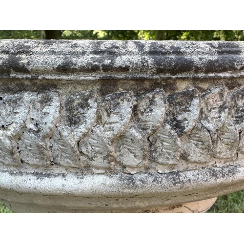 210 - GARDEN STAND, weathered reconstituted stone circular with carved edge on fluted column support, 49cm... 