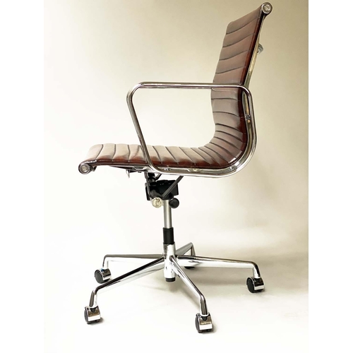 110 - REVOLVING DESK CHAIR, Charles and Ray Eames inspired with ribbed soft tan brown leather seat revolvi... 