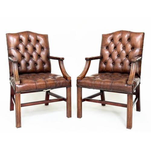 113 - GAINSBOROUGH ARMCHAIRS, a pair, George III design mahogany with deep buttoned soft antique tan leath... 