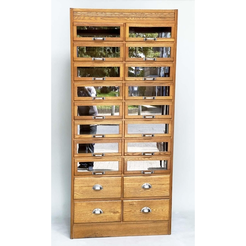 114 - HABERDASHERY CABINET, mid 20th century oak with sixteen glazed drawers above four further drawers, 1... 