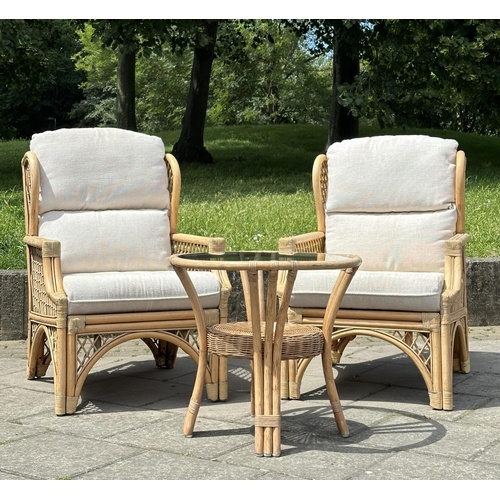 117 - ORANGERY STYLE ARMCHAIRS, a pair, vintage wingback rattan and cane bound with lattice sides and seat... 