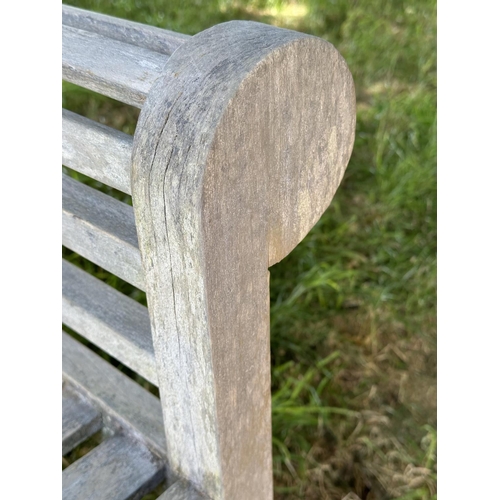 122 - LUTYENS STYLE GARDEN BENCH, well weathered slatted teak after the design by Sir Edwin Lutyens, 165cm... 