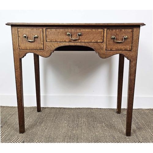 130 - LOWBOY, George III oak and mahogany banded with three drawers, 73cm H x 81cm W x 50cm D.