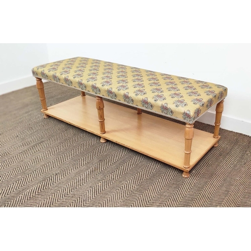 135 - LONG STOOL, pine with yellow patterned upholstery, 47cm H x 150cm W x 45cm D.