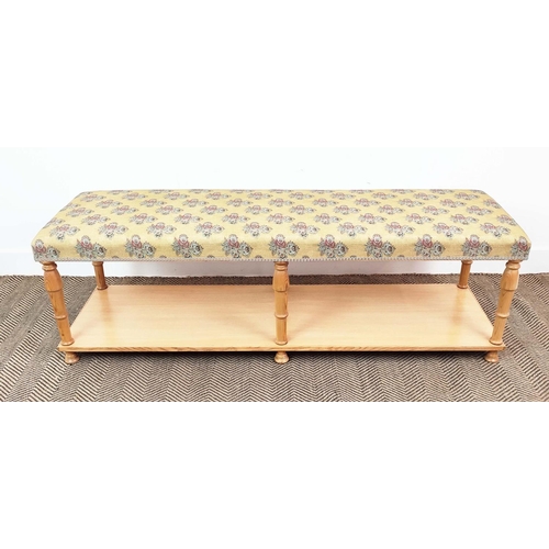 135 - LONG STOOL, pine with yellow patterned upholstery, 47cm H x 150cm W x 45cm D.