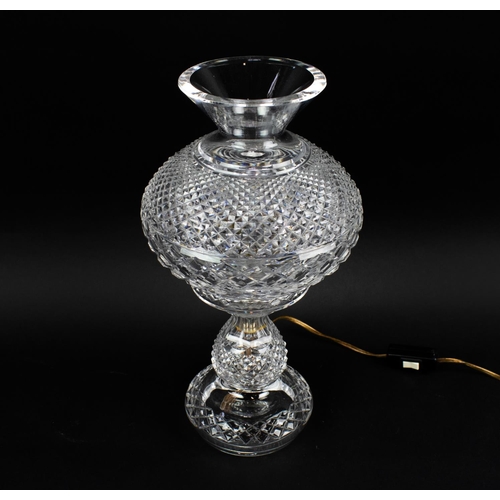 17 - A WATERFORD GLASS TABLE LAMP, with glass shade, together with a Waterford mantel clock. (2)