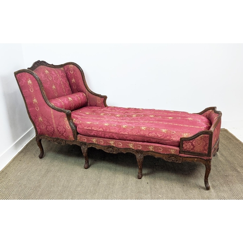 174 - DAY BED, Louis XV walnut, circa 1760, with a carved showframe and red damask upholstery, 220cm L x 8... 