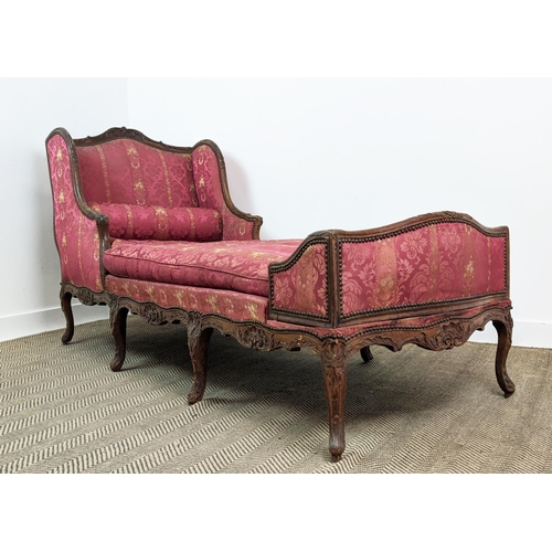 174 - DAY BED, Louis XV walnut, circa 1760, with a carved showframe and red damask upholstery, 220cm L x 8... 