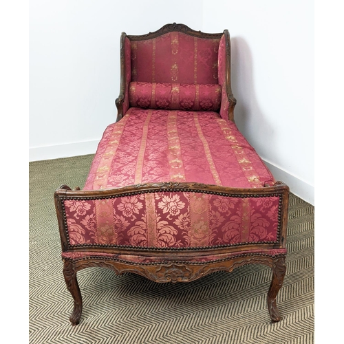 174 - DAY BED, Louis XV walnut, circa 1760, with a carved showframe and red damask upholstery, 220cm L x 8... 