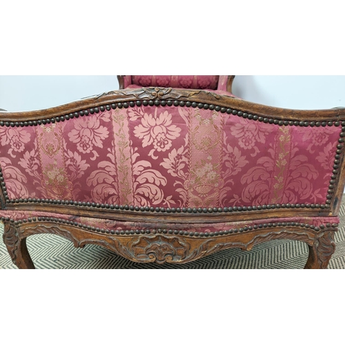 174 - DAY BED, Louis XV walnut, circa 1760, with a carved showframe and red damask upholstery, 220cm L x 8... 