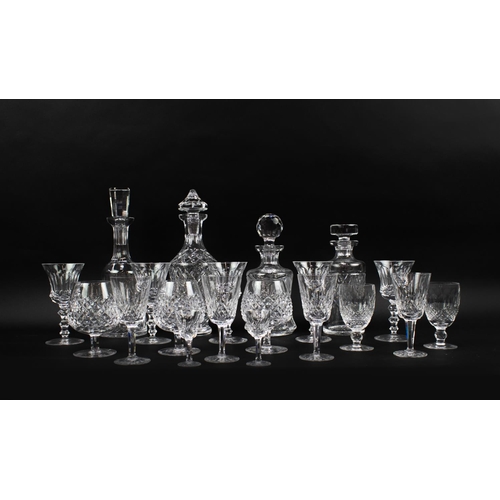 18 - FOUR WATERFORD GLASS DECANTERS, of various design, together with a small collection of drinking glas... 