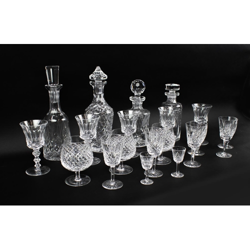 18 - FOUR WATERFORD GLASS DECANTERS, of various design, together with a small collection of drinking glas... 