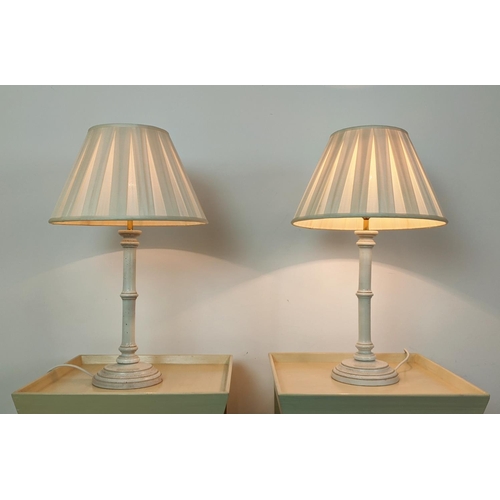 181 - OKA BEDSIDE TABLES, a pair, 74cm H x 42cm x 42, together with a pair of faux bamboo lamps. (4)