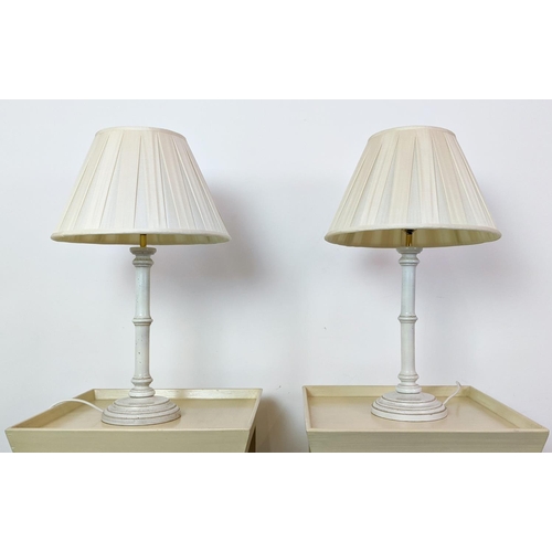 181 - OKA BEDSIDE TABLES, a pair, 74cm H x 42cm x 42, together with a pair of faux bamboo lamps. (4)