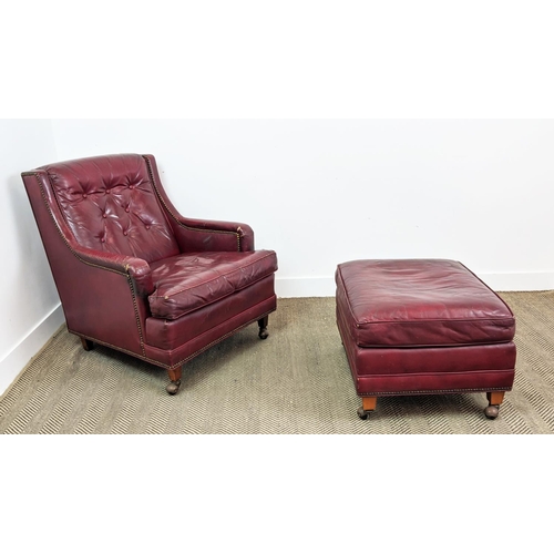 187 - CLUB ARMCHAIR, mid 20th century American red leather, 88cm H x 76cm W and a stool with ball castors,... 