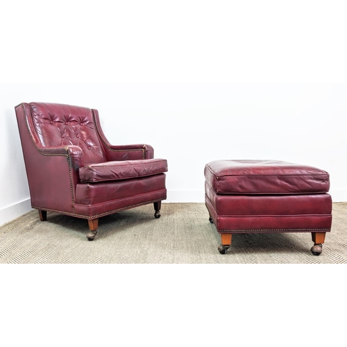 187 - CLUB ARMCHAIR, mid 20th century American red leather, 88cm H x 76cm W and a stool with ball castors,... 