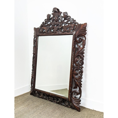 188 - WALL MIRROR, late 19th century Continental oak with lion crest and rectangular bevelled plate, 139cm... 