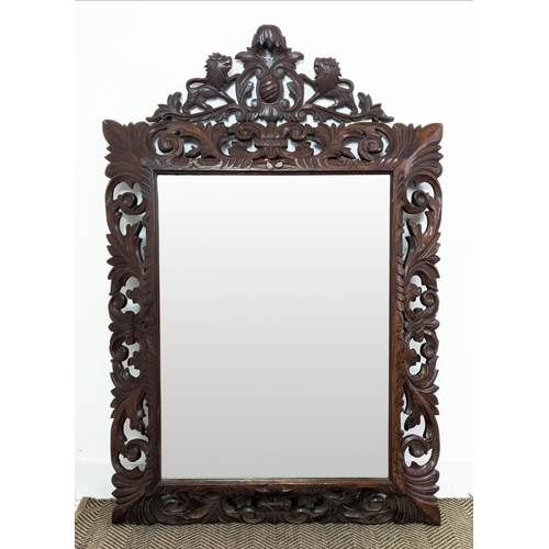 188 - WALL MIRROR, late 19th century Continental oak with lion crest and rectangular bevelled plate, 139cm... 