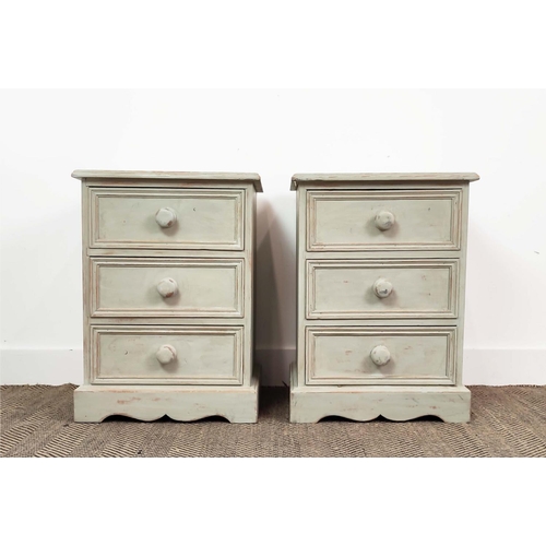 221 - BEDSIDE CHESTS, a pair, grey painted, each with three drawers, 62cm H x 46cm W x 38cm D. (2)