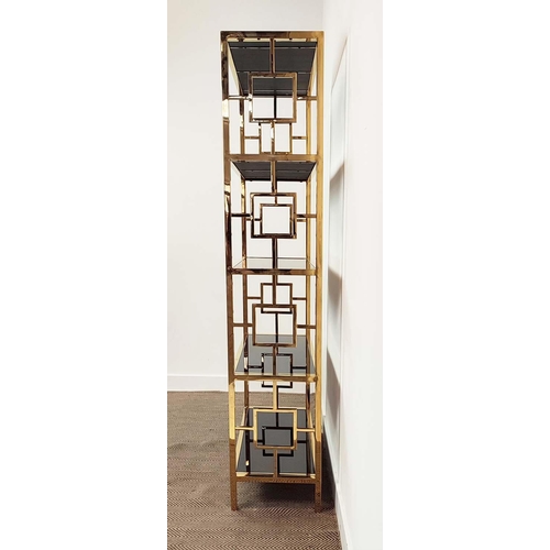 401 - ETAGERE, 1970s Italian style, glass shelves, gilt metal frame, 107.5cm x 37.5cm x 194cm.