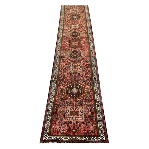 75 - FINE PERSIAN KARAJA RUNNER, 388cm x 80cm.