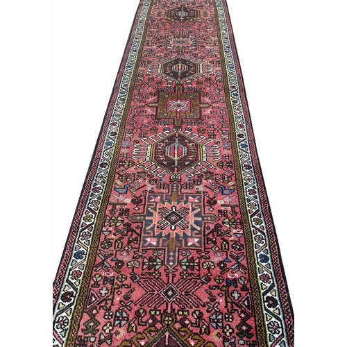 75 - FINE PERSIAN KARAJA RUNNER, 388cm x 80cm.