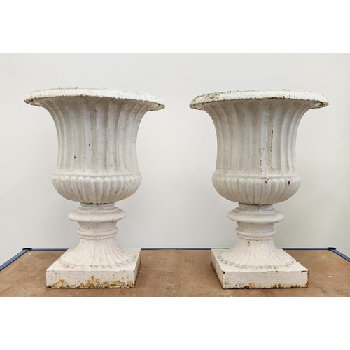 86 - GARDEN URNS, a pair, 19th century white painted cast iron, 54cm H x 41cm D. (2)