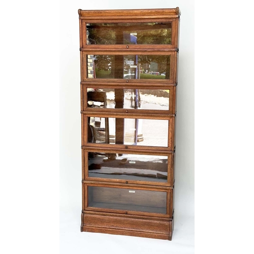 98 - GLOBE WERNICKE BOOKCASE, a tall set early 20th century oak with six graduated stacking sections, pli... 