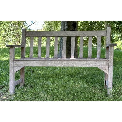 120 - GARDEN BENCH, well weathered slatted teak with flat arms, 82cm H 127cm W.