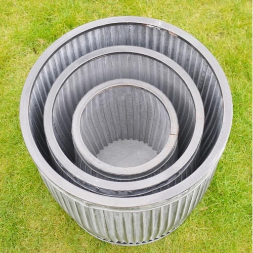 363 - DOLLY TUB PLANTERS, a graduated set of three, galvanized metal, Largest 50cm H x 45cm W (3)