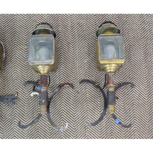 165 - CARRIAGE LAMPS, a pair, four brass, electrified with brackets, each 55cm tall. (2)