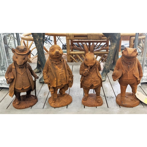 408 - SCULPTURAL CHARACTERS, a set of four, cast metal, 29cm H at tallest approx. (4)