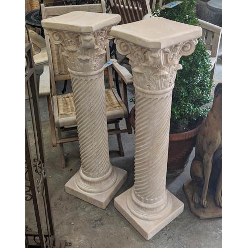 414 - CORINTHIAN COLUMN DISPLAY PEDESTALS, a pair, faux stone, 106cm H.