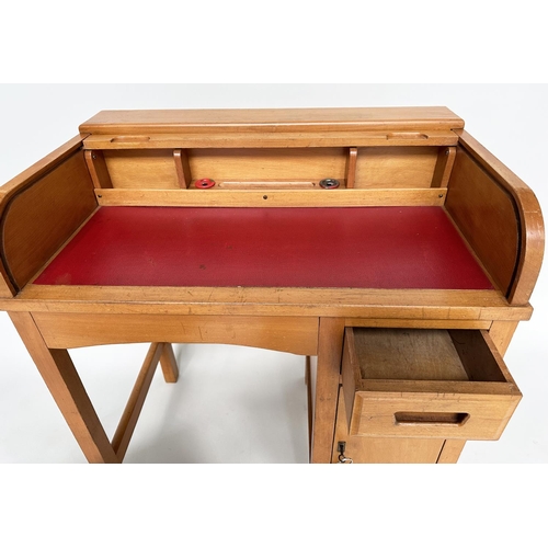 112 - CHILDS DESK AND CHAIR BY TAYLORS OF LEICESTER, 1950's beech with roll top, locking cabinet and swive... 