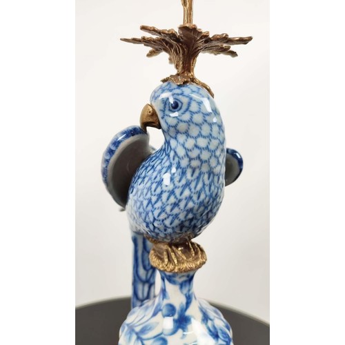 392 - PARROT CANDLESTICKS, a pair, blue and white ceramic and gilt metal, 50cm H. (2)