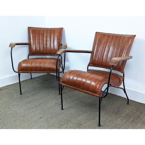 379 - ARMCHAIRS, a pair, tan leather upholstery, 74cm H x 65cm x 70cm. (2)