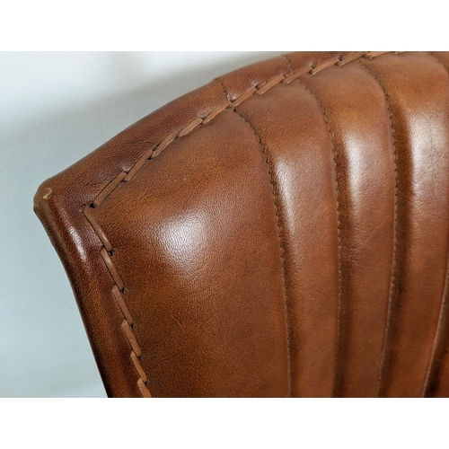 379 - ARMCHAIRS, a pair, tan leather upholstery, 74cm H x 65cm x 70cm. (2)