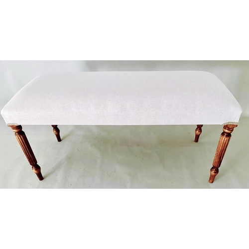 432 - FOOTSTOOL, neutral linen upholstery on reeded supports, 48cm H x 98cm L x 40cm W