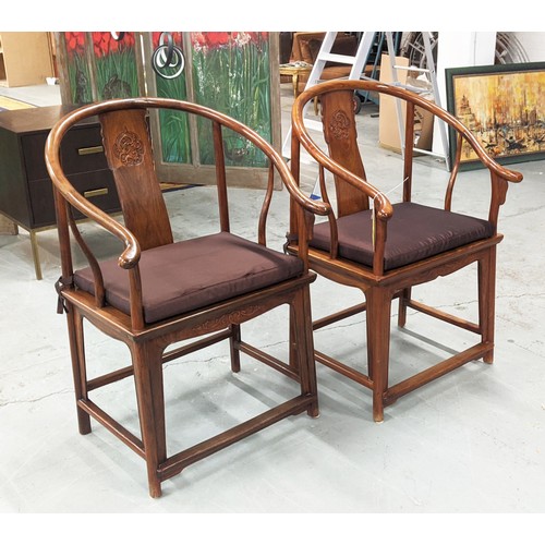 428 - ARMCHAIRS, a pair, Chinese style horseshoe design, with seat cushions, 68.5cm W approx. (2)