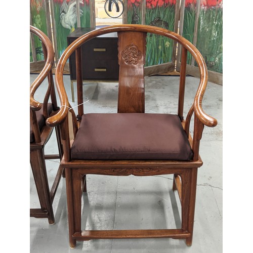 428 - ARMCHAIRS, a pair, Chinese style horseshoe design, with seat cushions, 68.5cm W approx. (2)