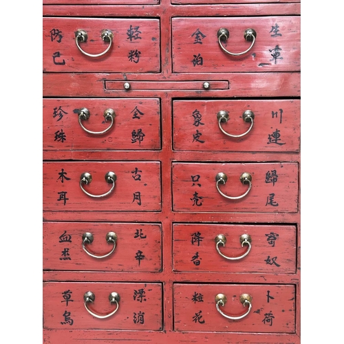 291 - CHINESE CHEST, early 20th century scarlet lacquered with twelve short drawers, slide and silvered me... 