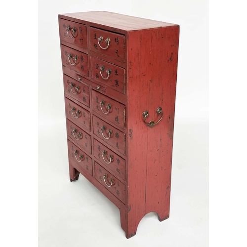 291 - CHINESE CHEST, early 20th century scarlet lacquered with twelve short drawers, slide and silvered me... 