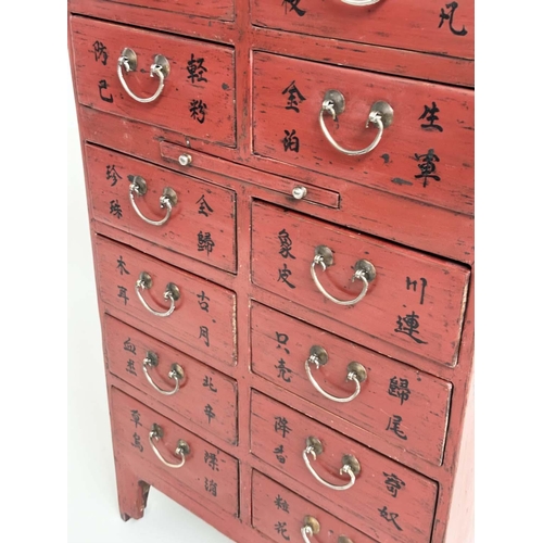 291 - CHINESE CHEST, early 20th century scarlet lacquered with twelve short drawers, slide and silvered me... 