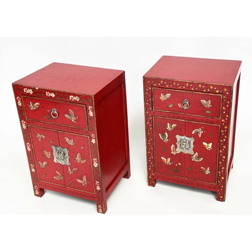 292 - CHINESE CABINETS, a set of two, scarlet lacquered and butterfly decorated, each with two doors and d... 