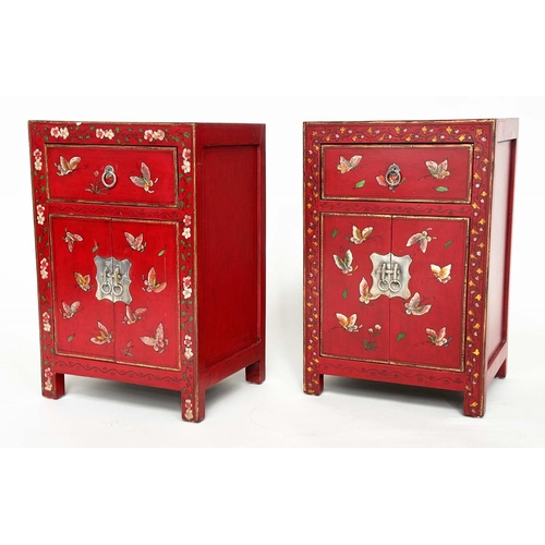 292 - CHINESE CABINETS, a set of two, scarlet lacquered and butterfly decorated, each with two doors and d... 