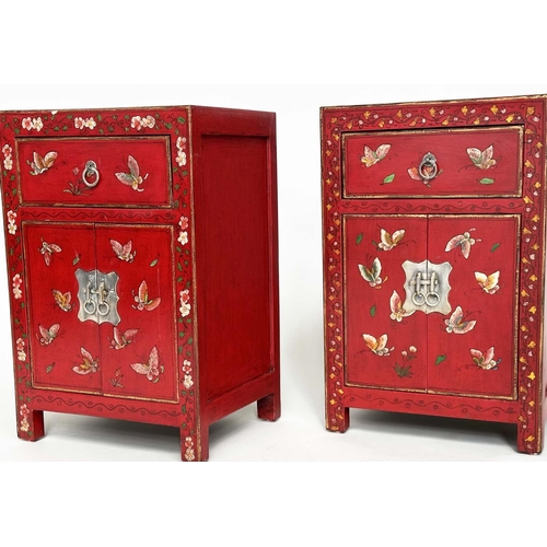 292 - CHINESE CABINETS, a set of two, scarlet lacquered and butterfly decorated, each with two doors and d... 