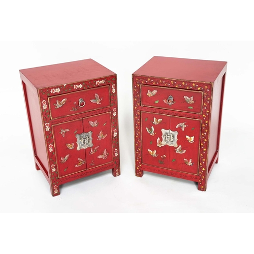 292 - CHINESE CABINETS, a set of two, scarlet lacquered and butterfly decorated, each with two doors and d... 