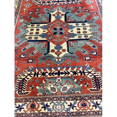 130 - FINE EAGLE KAZAK CARPET, 315cm x 255cm.